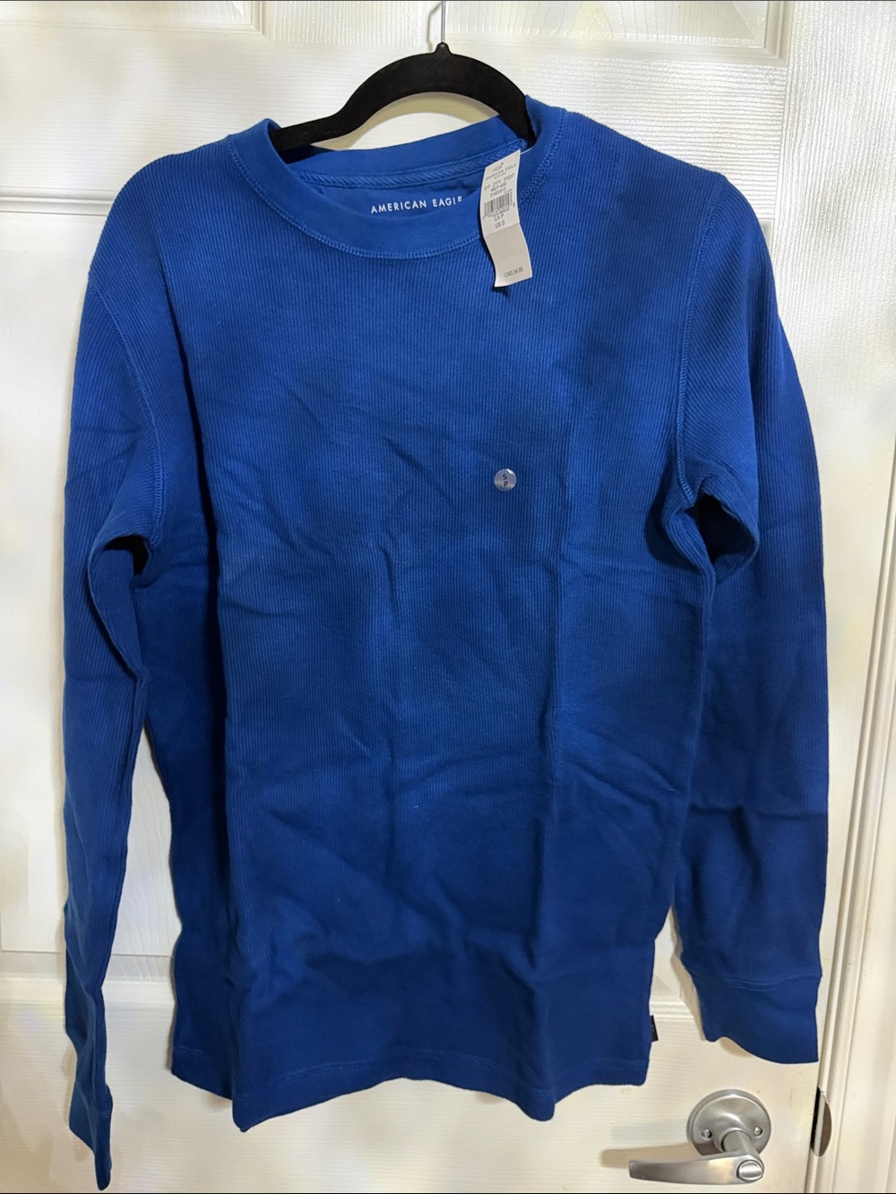 American Eagle men’s blue ribbed long sleeved sweater In Size S NWT MSRP 35$ cad